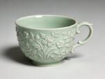 European Porcelain Tea Cup With Floral Relief